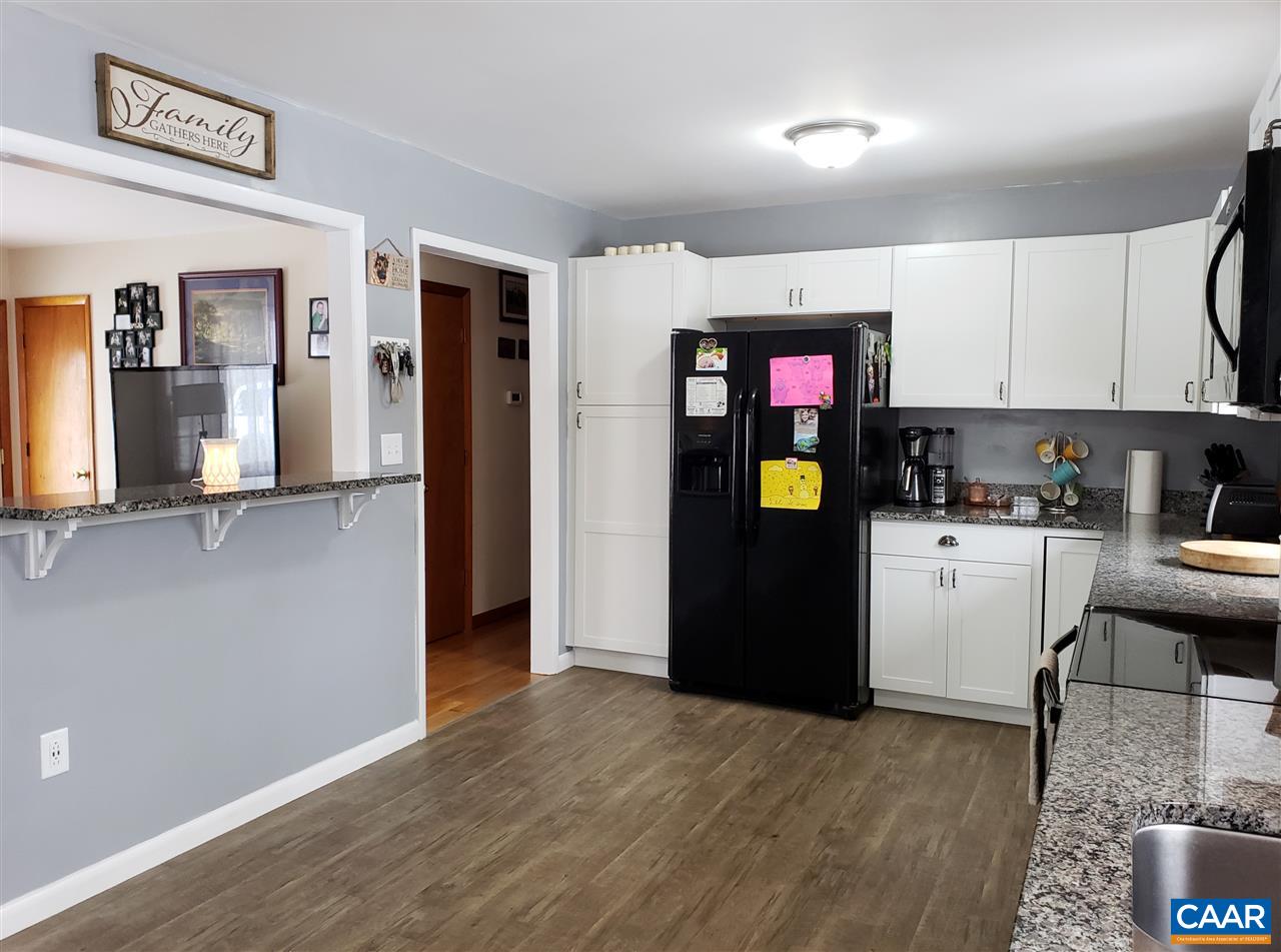 1141 Good Hope Church Road Aroda, VA 22709 - Photo 5 of 17 a kitchen with stainless steel appliances granite countertop a refrigerator and a stove top oven