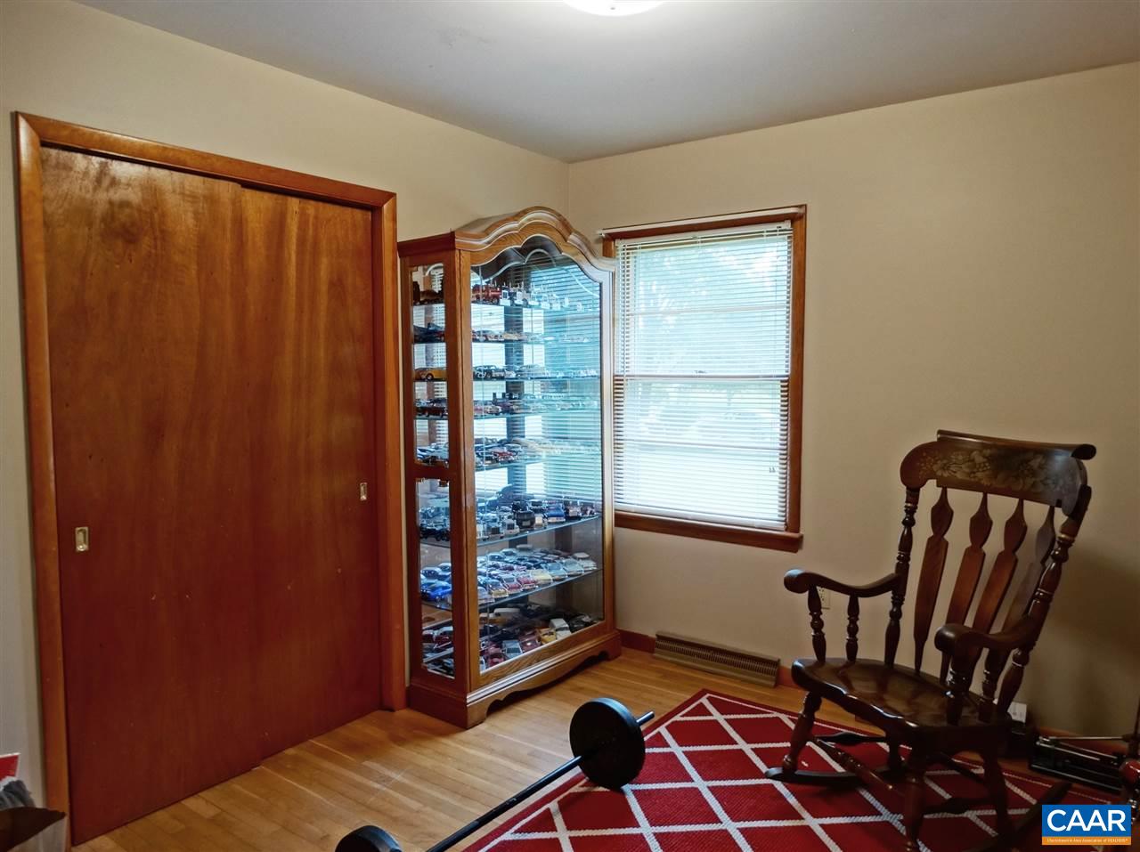 1141 Good Hope Church Road Aroda, VA 22709 - Photo 8 of 17 a room with furniture and a window