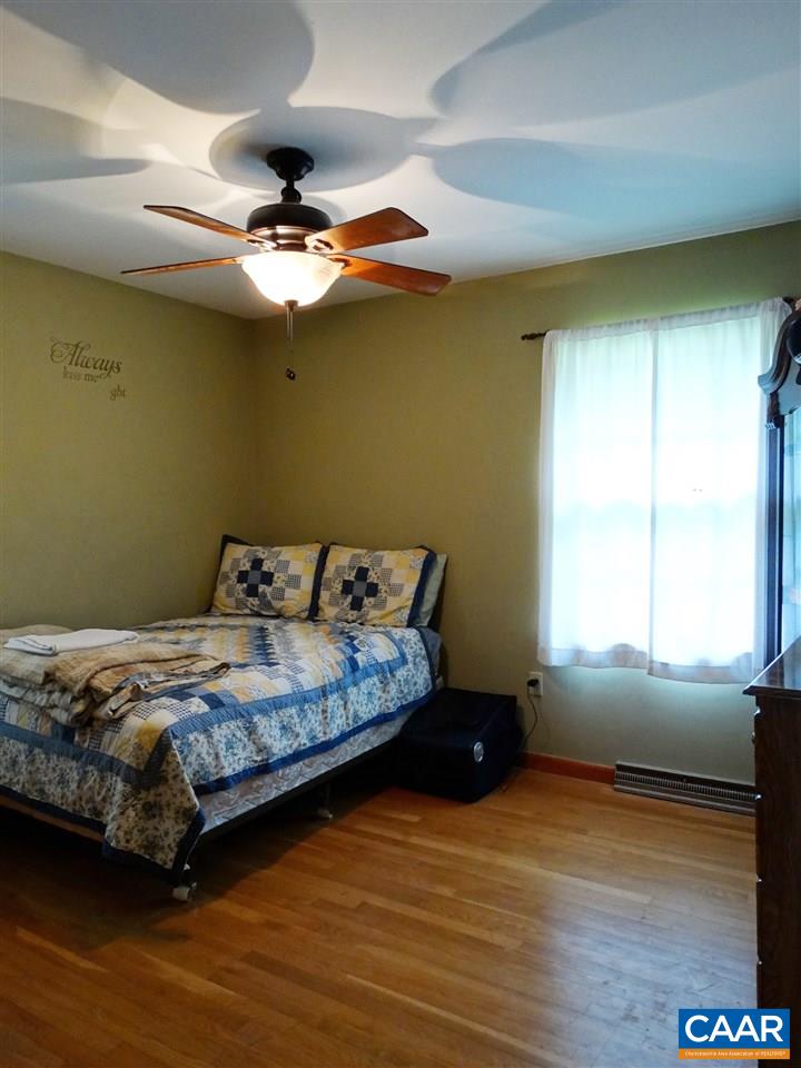 1141 Good Hope Church Road Aroda, VA 22709 - Photo 10 of 17 a bedroom with a bed and a window