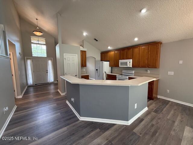 830 South Lilac Loop St. Johns, FL 32259 - Photo 11 of 40 a kitchen with stainless steel appliances granite countertop a refrigerator a sink dishwasher and a stove with wooden floor