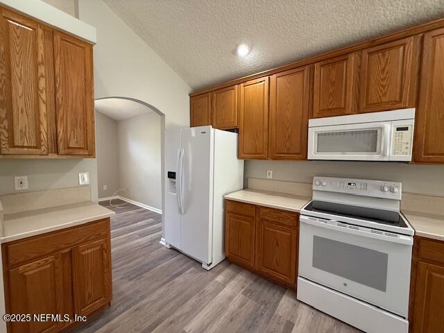 830 South Lilac Loop St. Johns, FL 32259 - Photo 12 of 40 a kitchen with a refrigerator stove and microwave