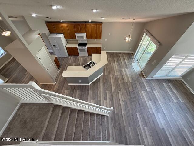 830 South Lilac Loop St. Johns, FL 32259 - Photo 16 of 40 a living room with couches and kitchen view with wooden floor