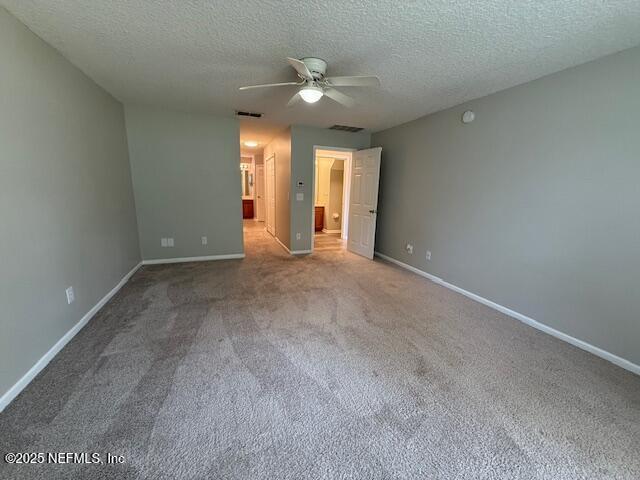 830 South Lilac Loop St. Johns, FL 32259 - Photo 19 of 40 a view of an empty room with a ceiling fan