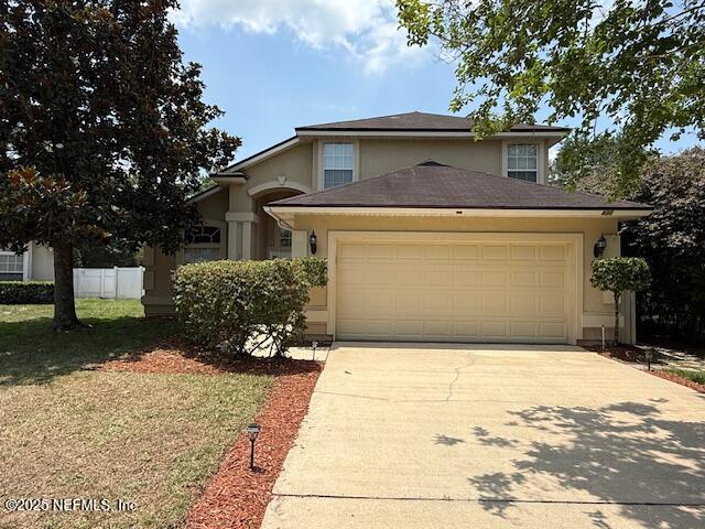 830 South Lilac Loop St. Johns, FL 32259 - Photo 3 of 40 a view of a house with a yard