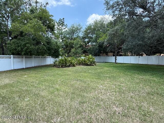 830 South Lilac Loop St. Johns, FL 32259 - Photo 40 of 40 a view of a backyard with a small cabin