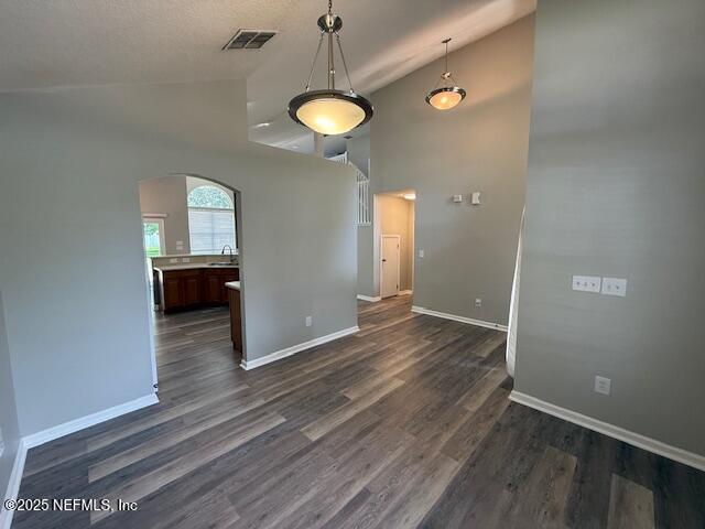 830 South Lilac Loop St. Johns, FL 32259 - Photo 7 of 40 an empty room with wooden floor and windows