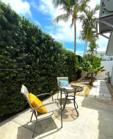 a view of a two chairs in the roof deck