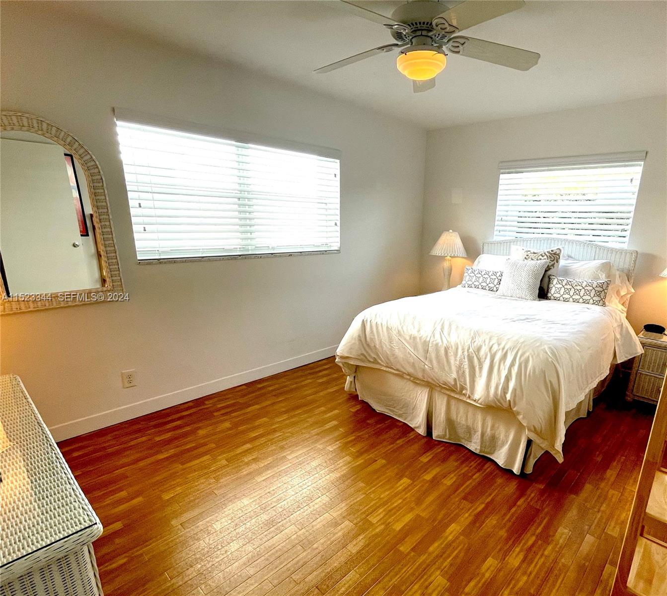 331 Desoto Street Hollywood, FL 33019 - Photo 8 of 12 a bedroom with a bed and a window