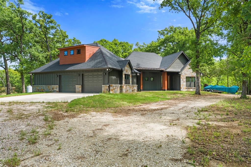 265 Shadow Oaks Streetman, TX 75859 - Photo 2 of 40 front view of a house with a yard