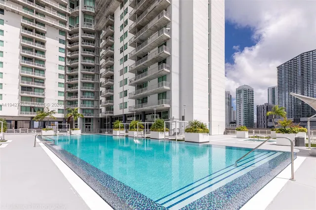 a view of a city with tall buildings