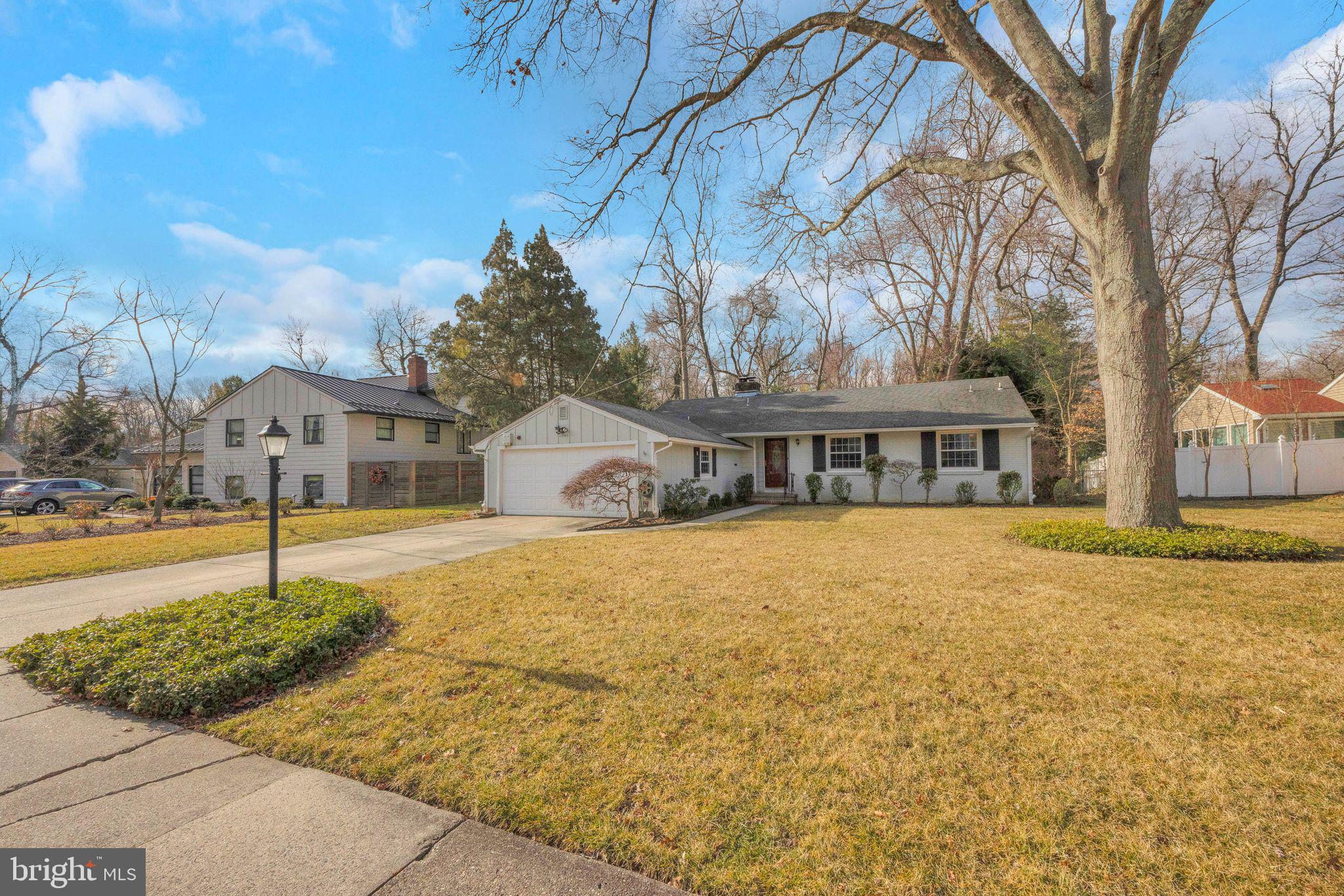 1246 Forge Road Cherry Hill, NJ 08034 - Photo 1 of 34 a front view of a house with a yard