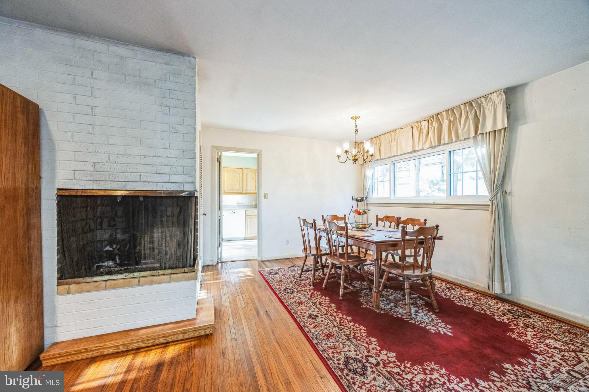 1246 Forge Road Cherry Hill, NJ 08034 - Photo 14 of 34 a view of a dining room with furniture and wooden floor