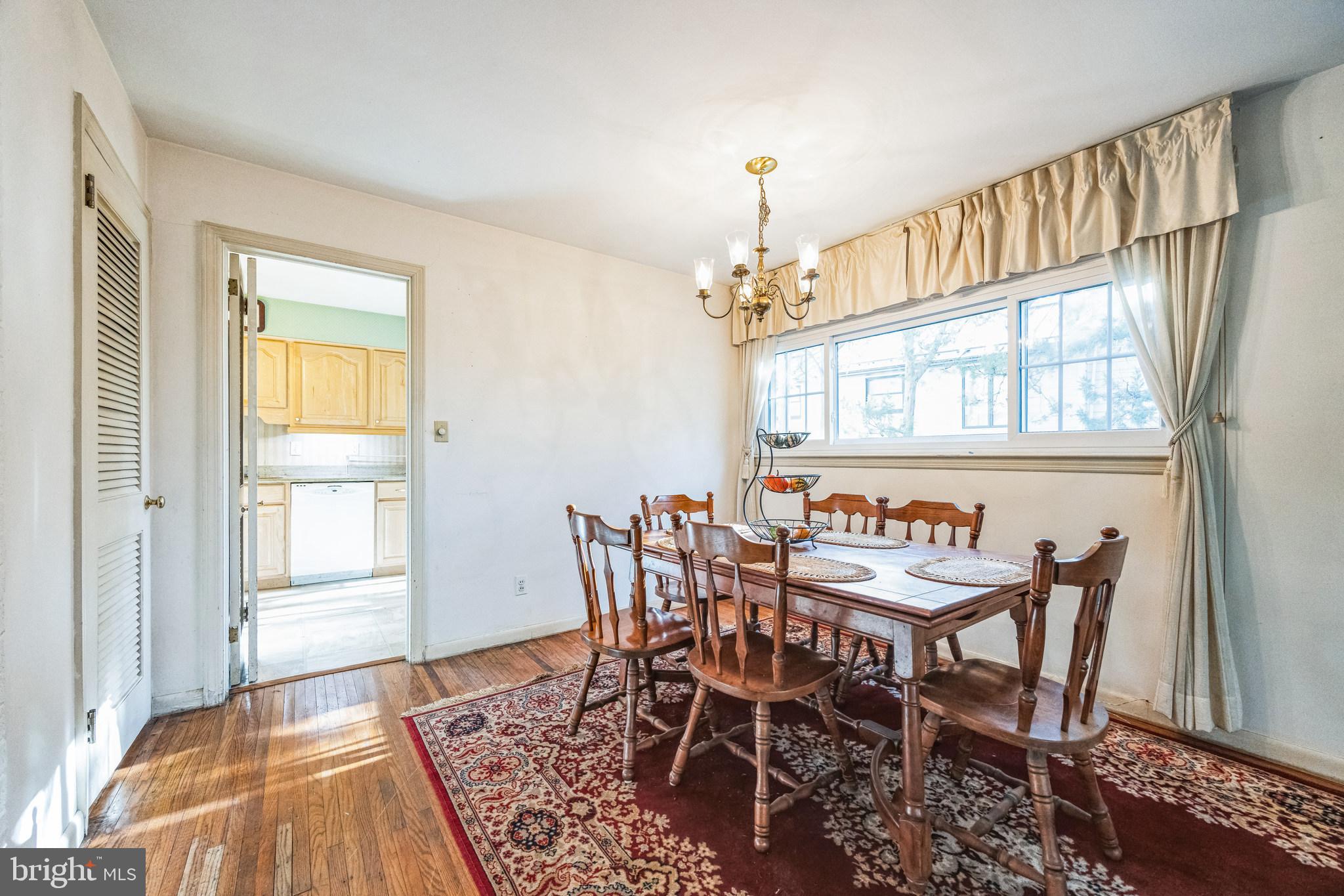 1246 Forge Road Cherry Hill, NJ 08034 - Photo 15 of 34 a view of a dining room with furniture and chandelier