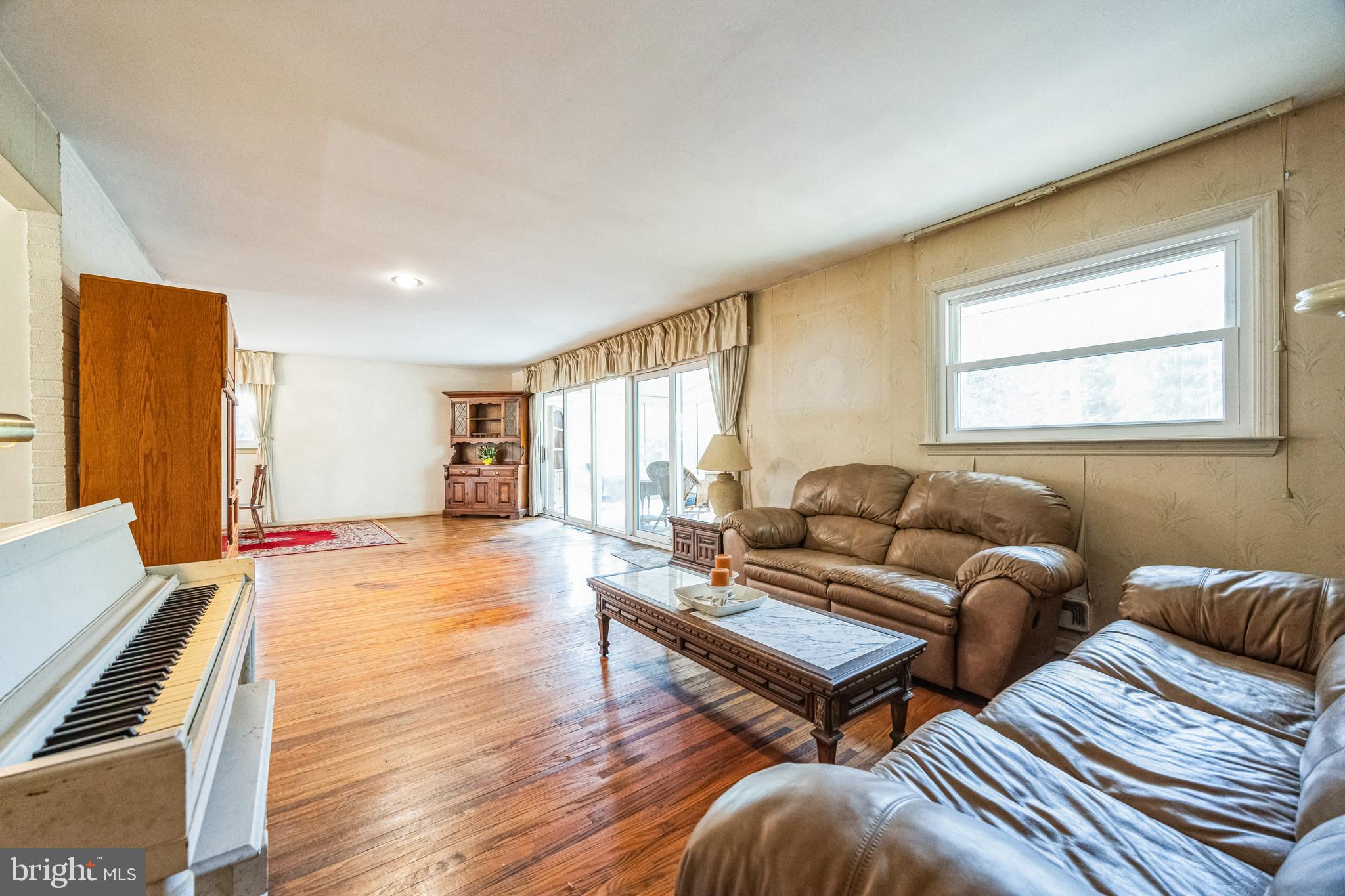 1246 Forge Road Cherry Hill, NJ 08034 - Photo 20 of 34 a living room with furniture and a window