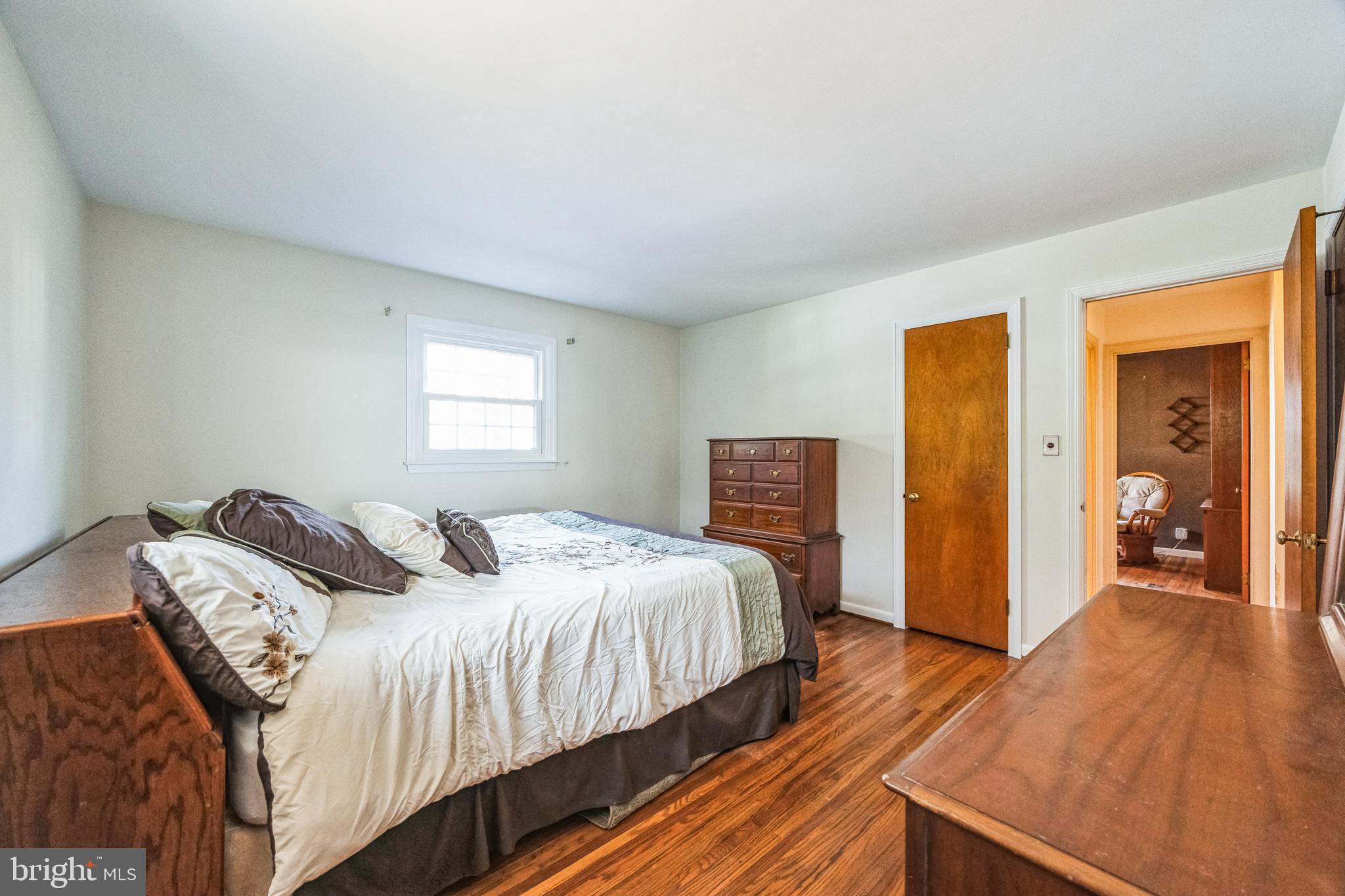 1246 Forge Road Cherry Hill, NJ 08034 - Photo 24 of 34 a bedroom with a bed and a dresser