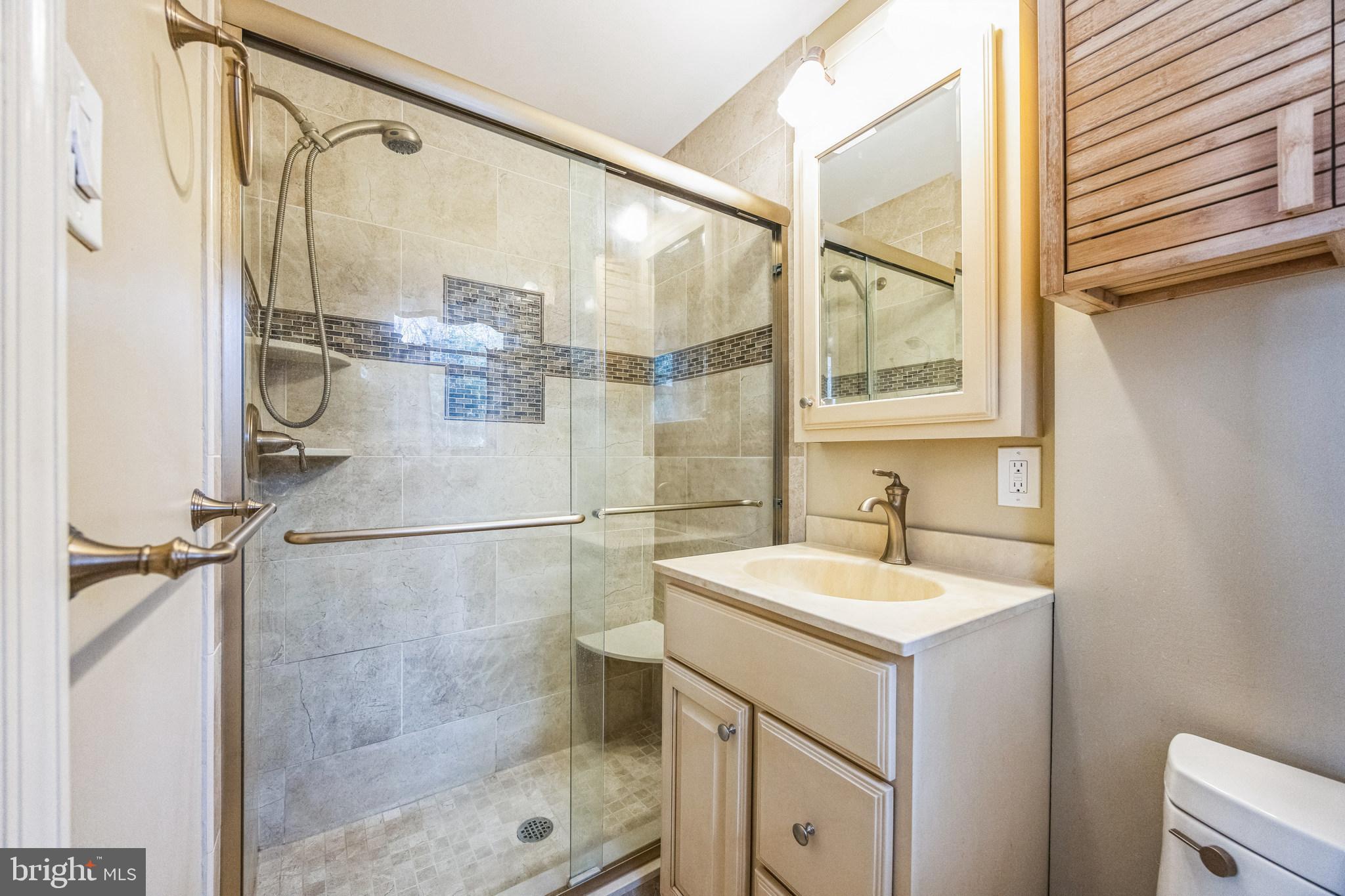1246 Forge Road Cherry Hill, NJ 08034 - Photo 26 of 34 a bathroom with a sink and a mirror