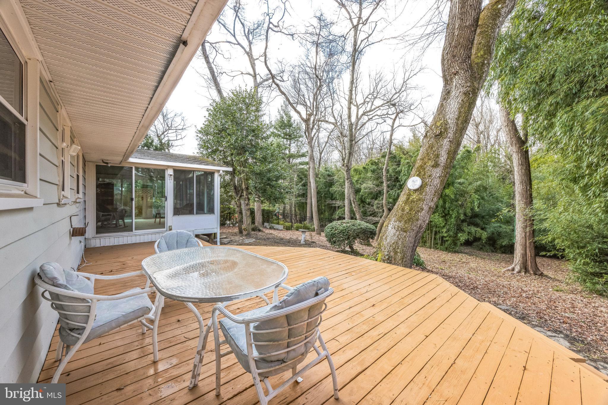 1246 Forge Road Cherry Hill, NJ 08034 - Photo 32 of 34 a outdoor view with a sitting space and large trees