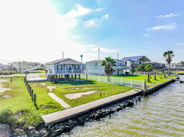 a view of a swimming pool with an ocean view