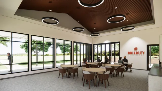 a outdoor space with lots of tables and chairs