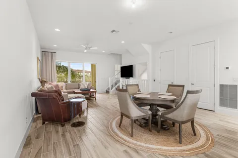 a balcony view with couple of chairs