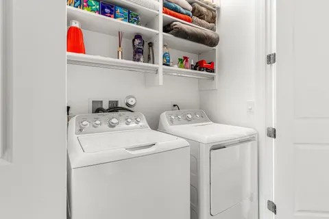 a view of a storage room with furniture