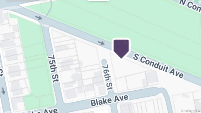 a view of staircase with white walls