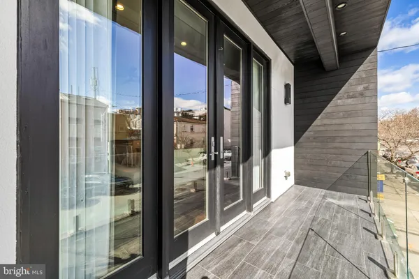 a view of a porch with a door