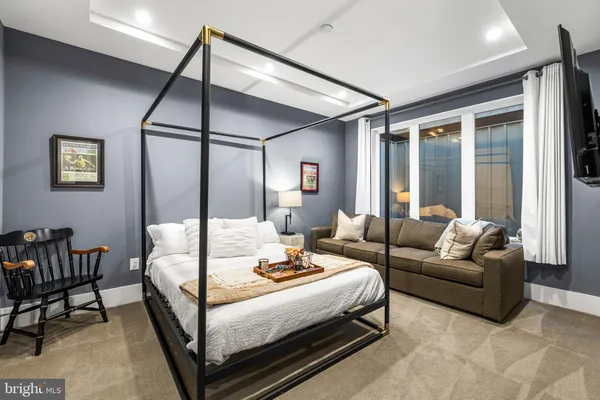 a living room with furniture and a table