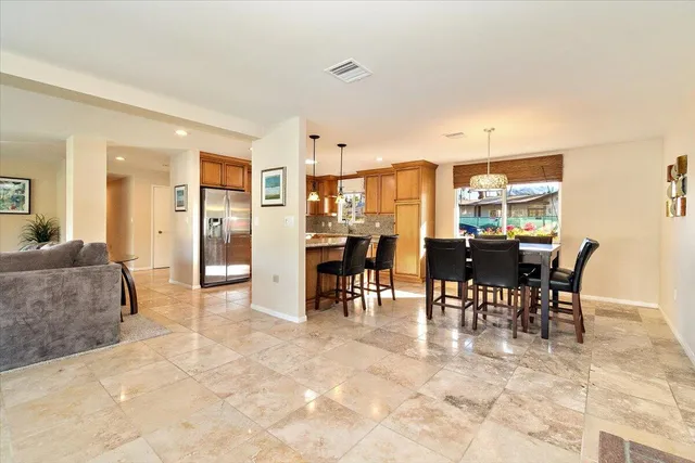a view of a a dining room with furniture