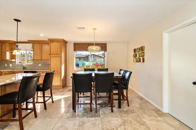 a view of a dining room with furniture