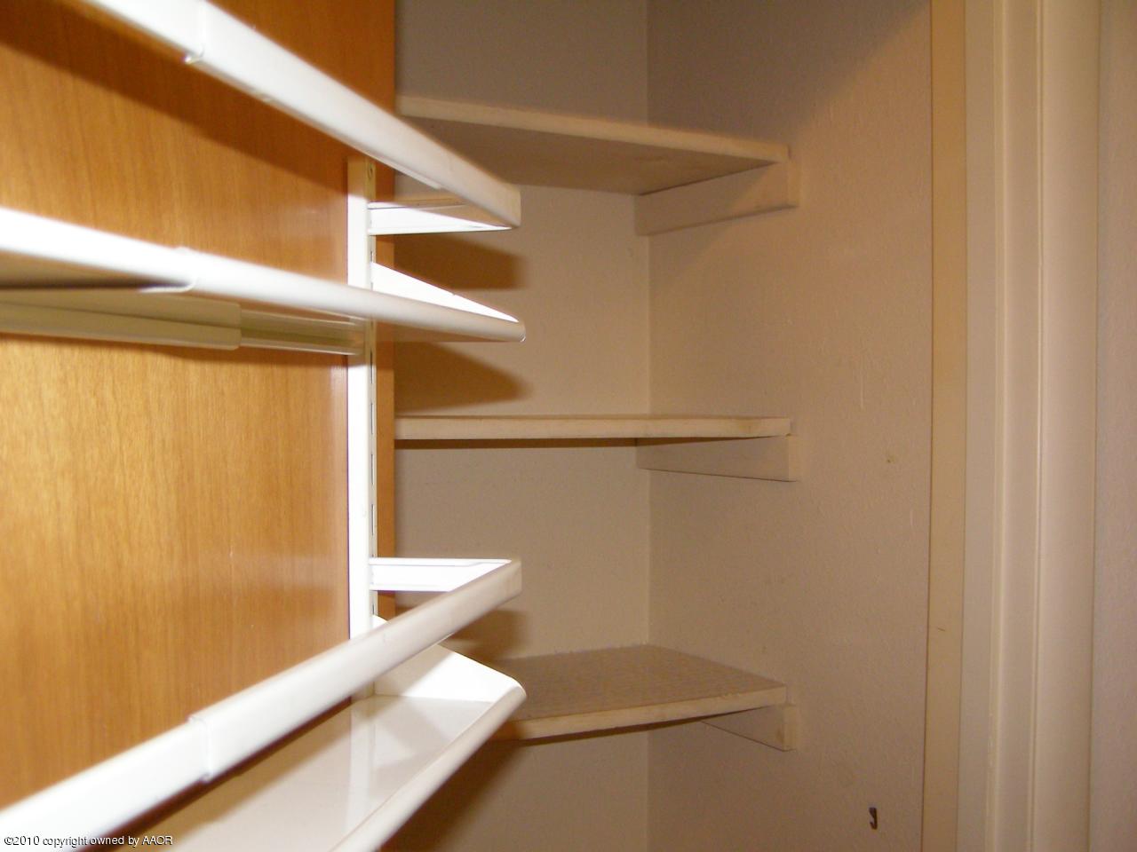 6208 Hanson Road Amarillo, TX 79106 - Photo 14 of 17 Pantry in Utility Room