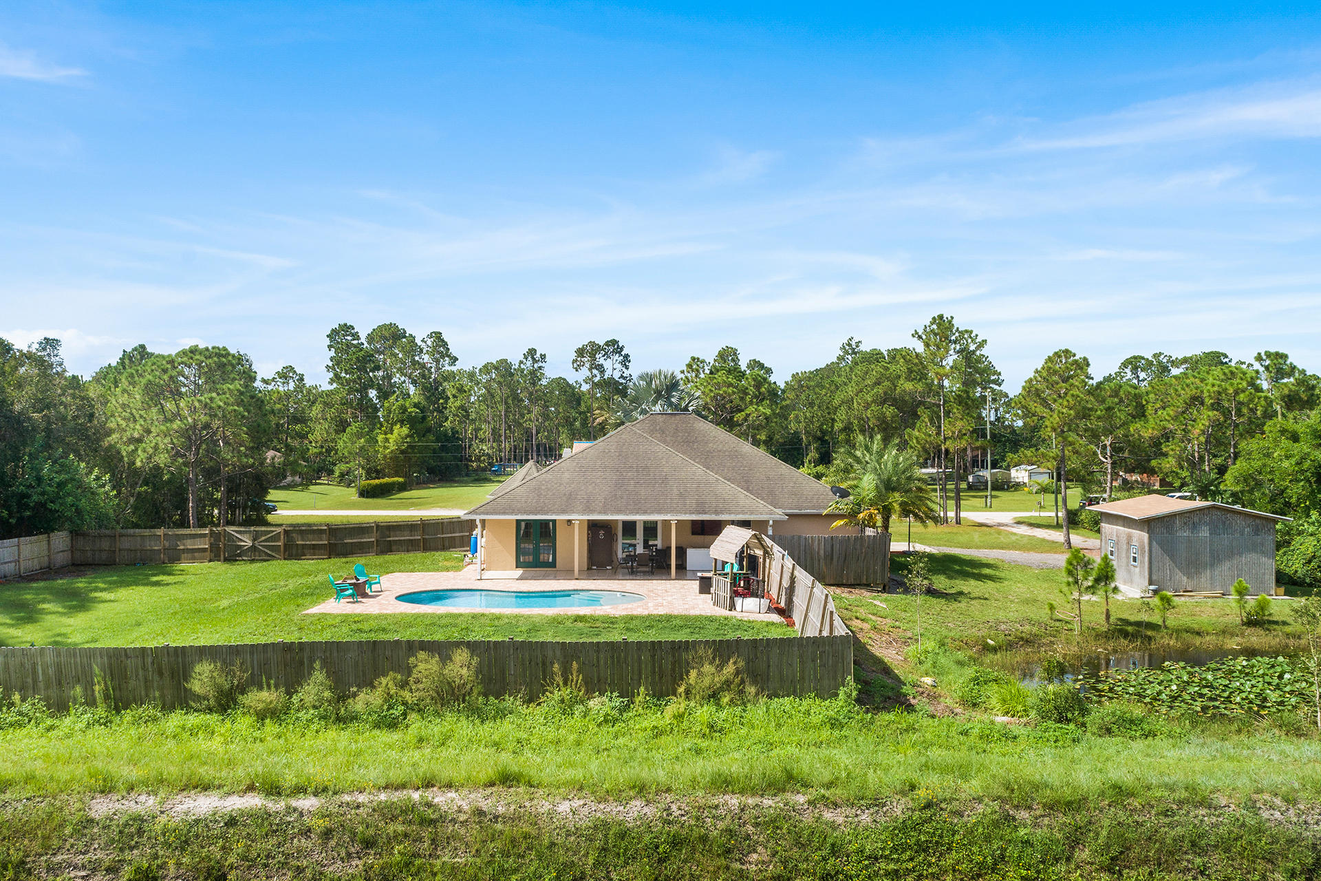 14899 86th Road North Loxahatchee, FL 33470 - Photo 26 of 34 Drone backyard
