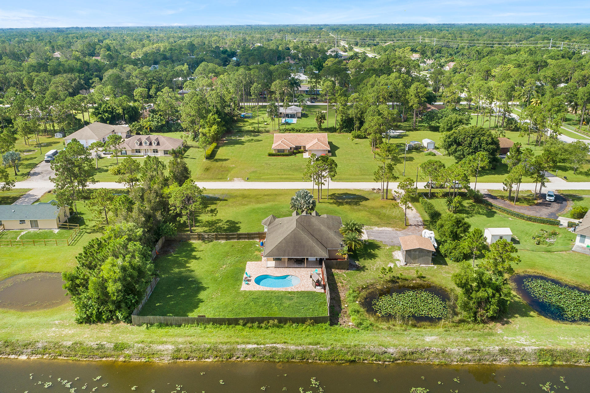 14899 86th Road North Loxahatchee, FL 33470 - Photo 30 of 34 Drone backyard