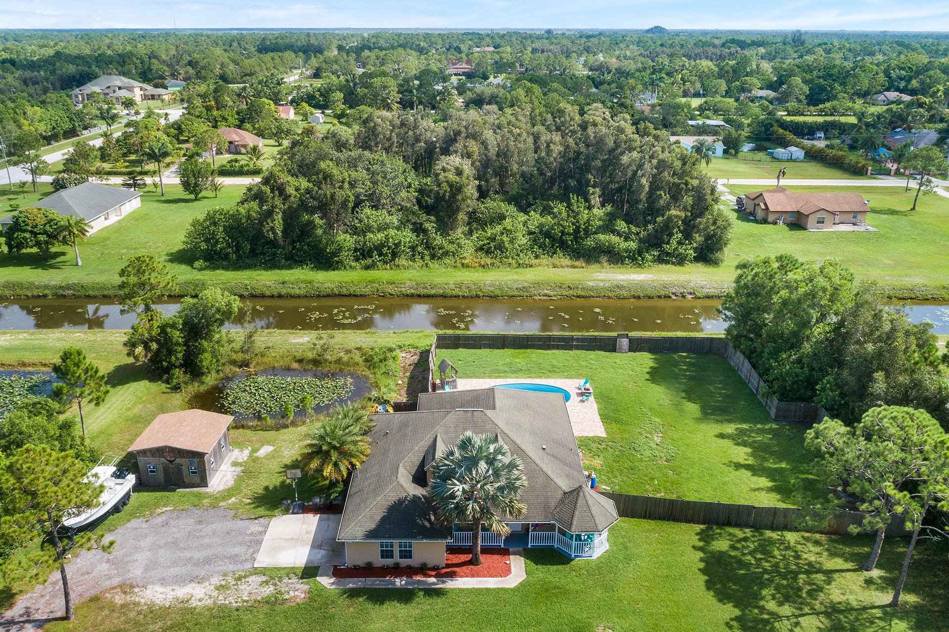 14899 86th Road North Loxahatchee, FL 33470 - Photo 33 of 34 Drone front closer