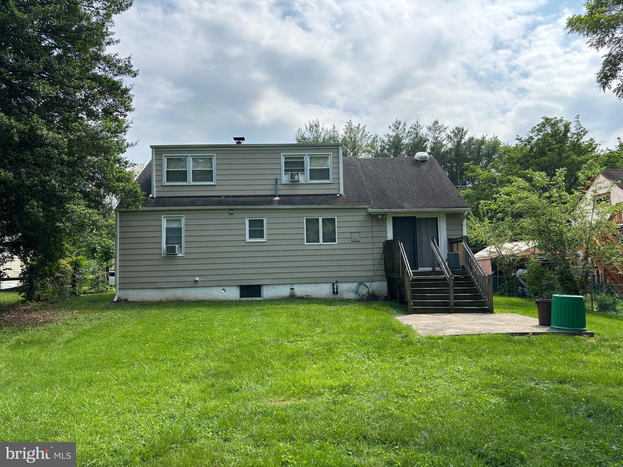 438 Ewingville Road Ewing, NJ 08638 - Photo 13 of 43 a view of a back yard of the house