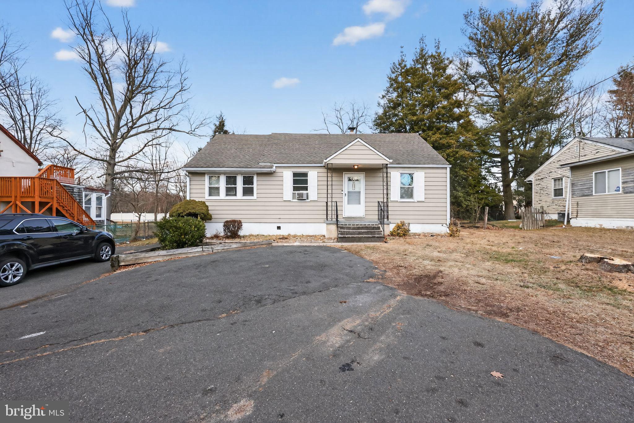 438 Ewingville Road Ewing, NJ 08638 - Photo 15 of 43 a view of a house with a yard