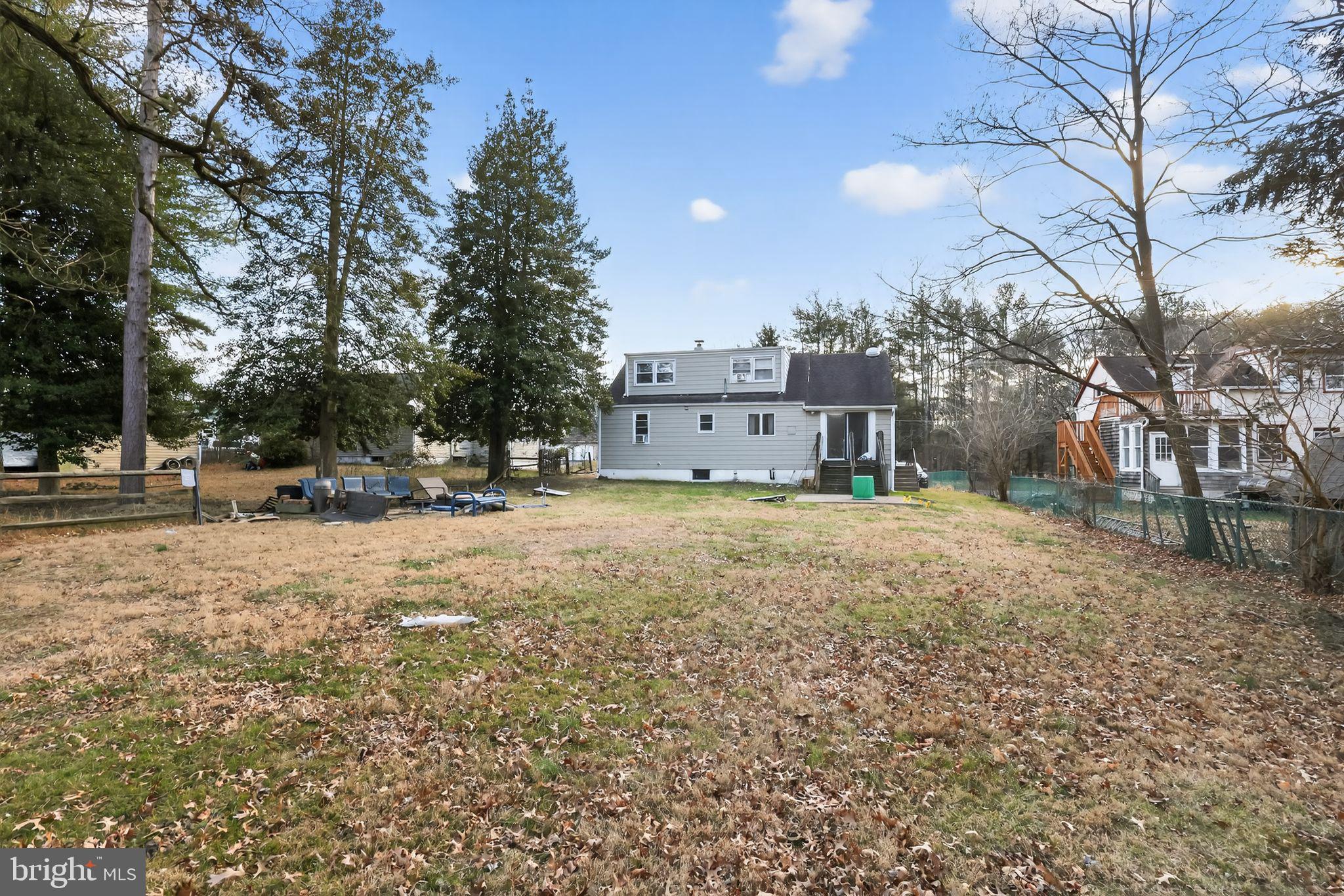 438 Ewingville Road Ewing, NJ 08638 - Photo 16 of 43 a view of a yard with a house