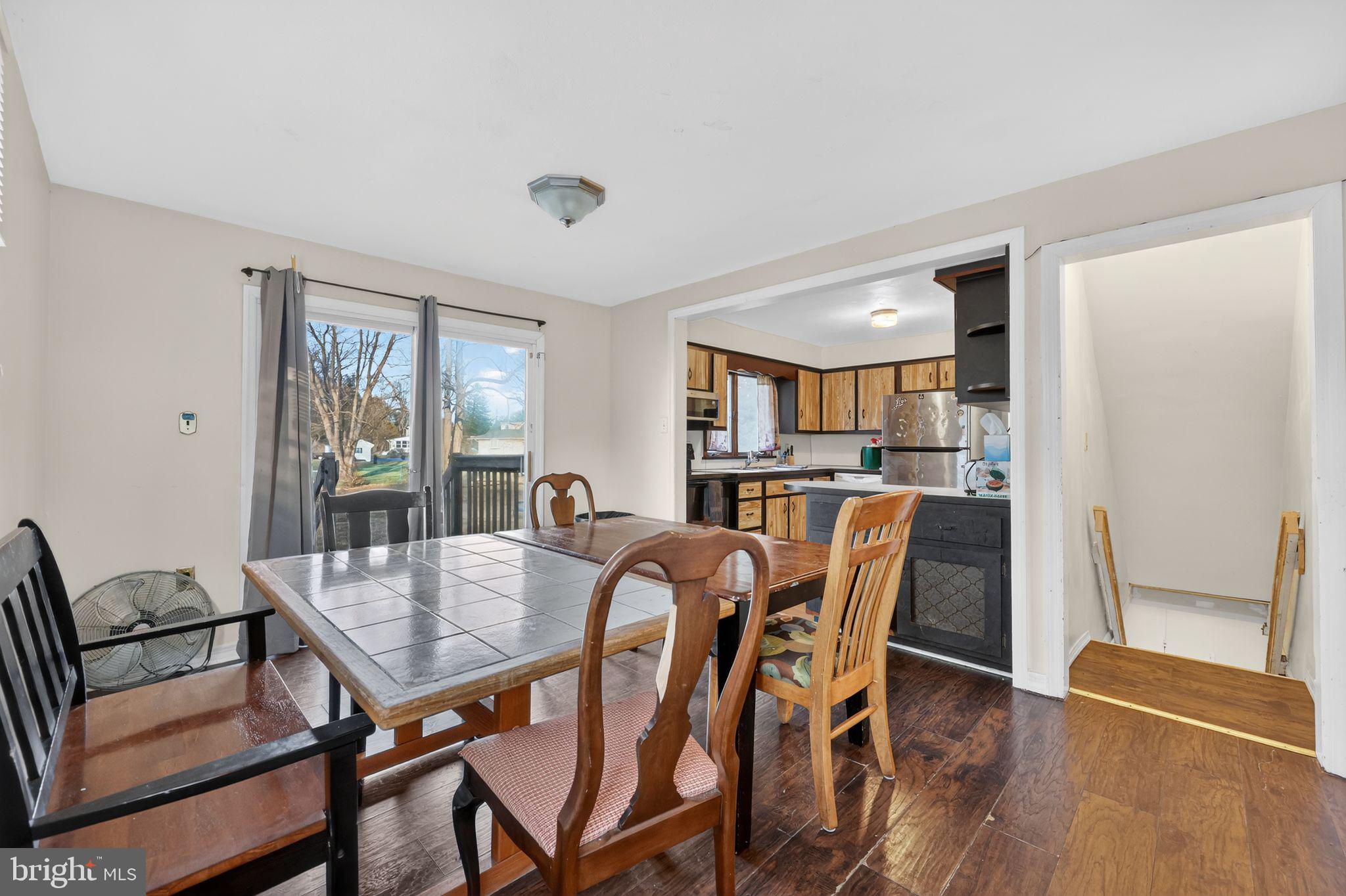 438 Ewingville Road Ewing, NJ 08638 - Photo 27 of 43 a view of a dining room with furniture and wooden floor
