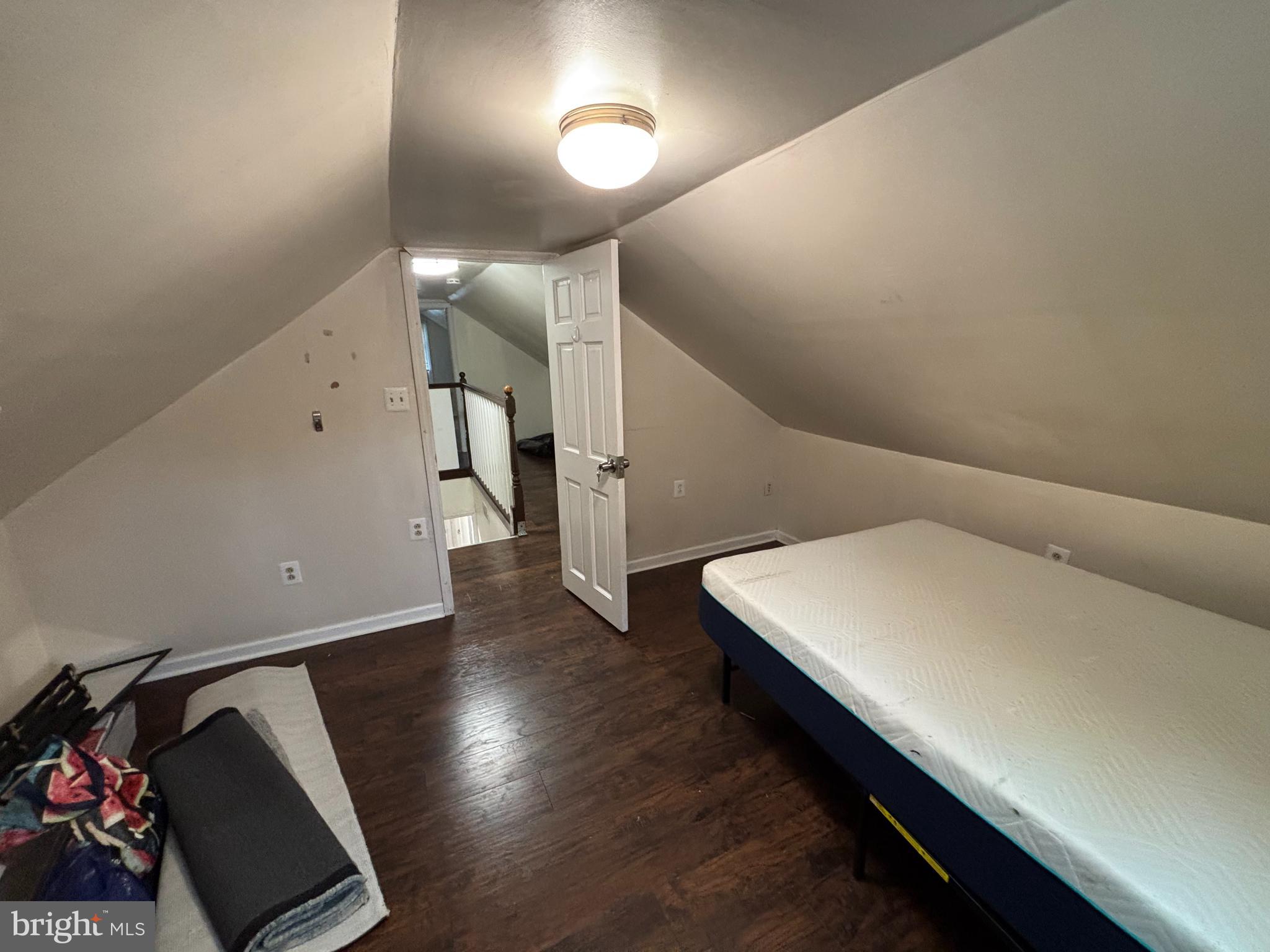 438 Ewingville Road Ewing, NJ 08638 - Photo 4 of 43 a view of an empty room with wooden floor