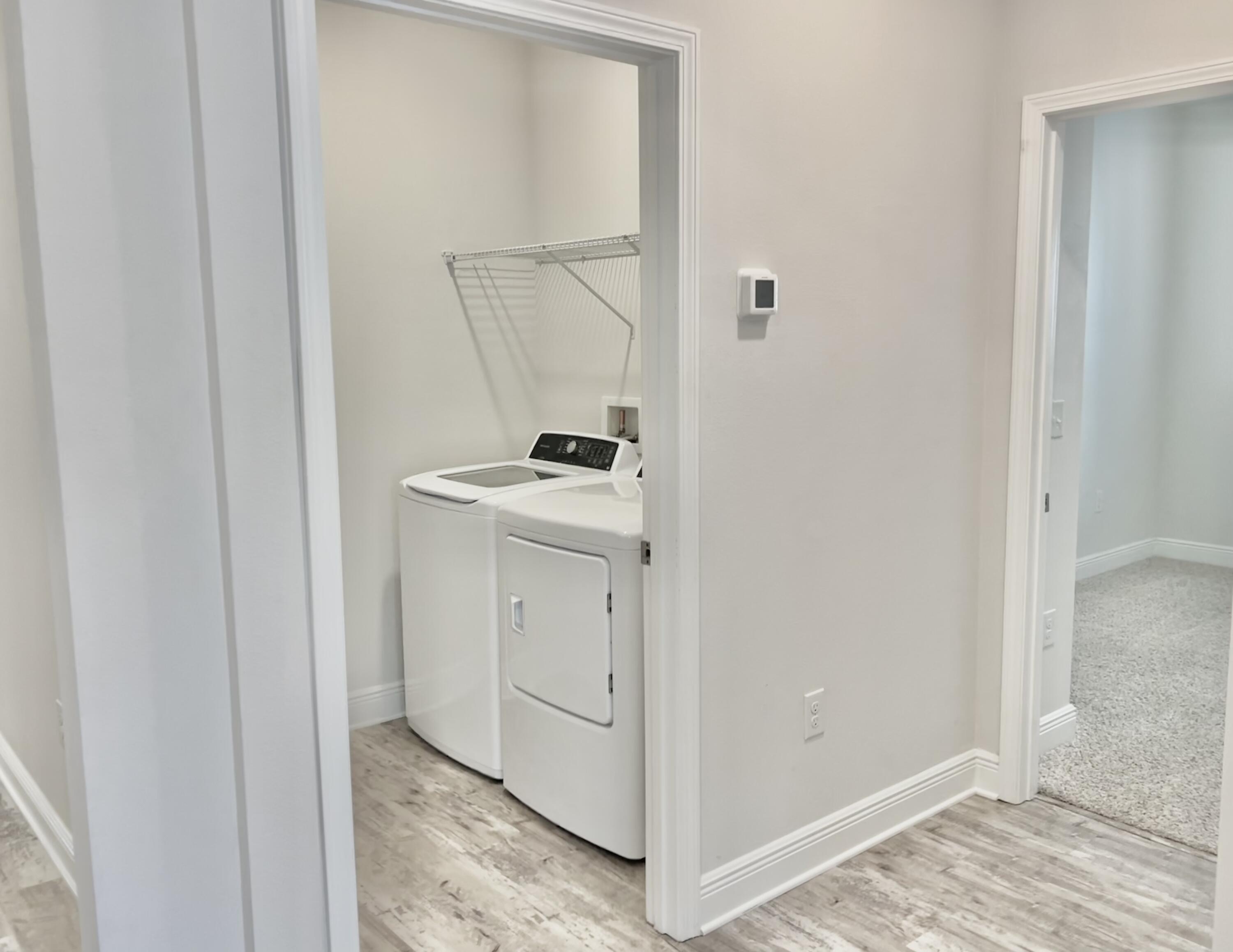 161 Southern Pnes Road, Unit LOT 11 Santa Rosa Beach, FL 32459 - Photo 5 of 35 a view of a storage and utility room with a sink