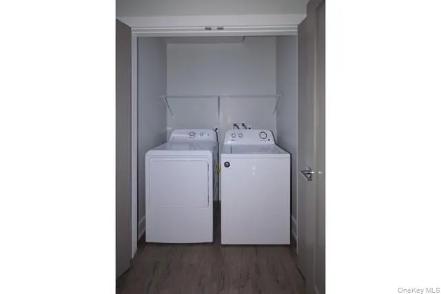 a utility room with dryer and washer