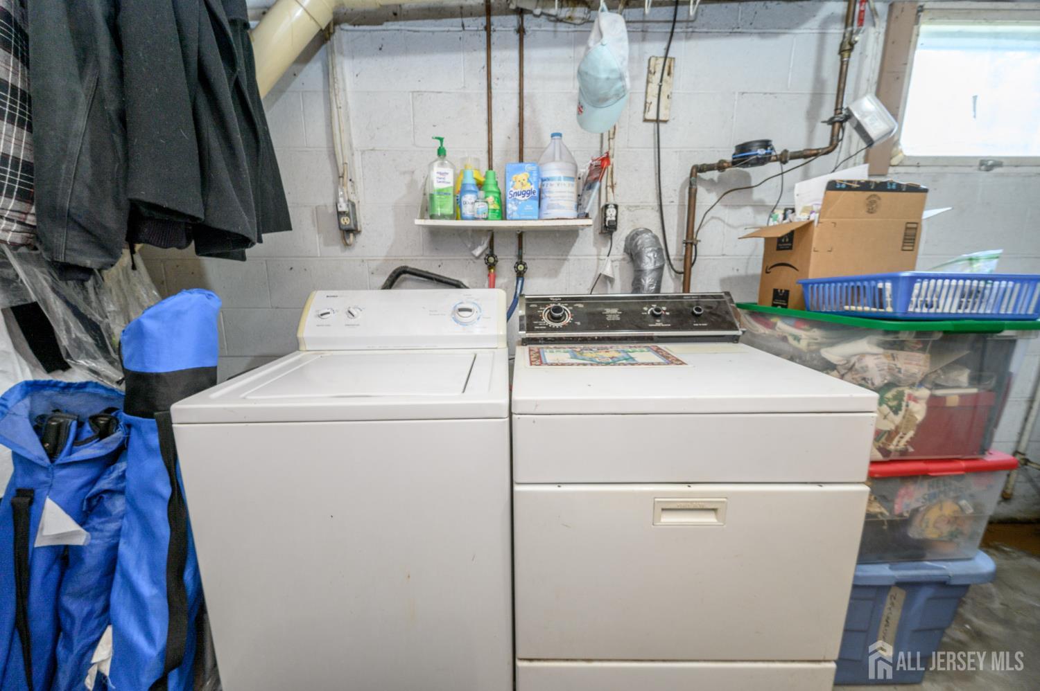 1650 Holly Road North Brunswick, NJ 08902 - Photo 22 of 41 a utility room with dryer and washer