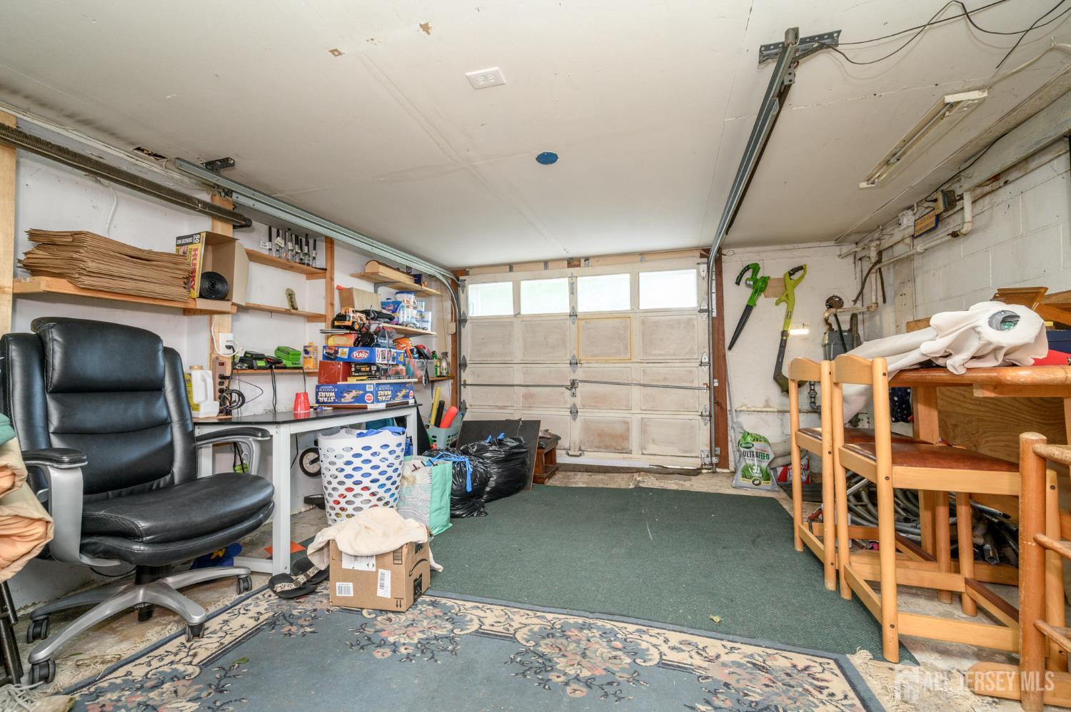 1650 Holly Road North Brunswick, NJ 08902 - Photo 23 of 41 a room with lots of white furniture and a window