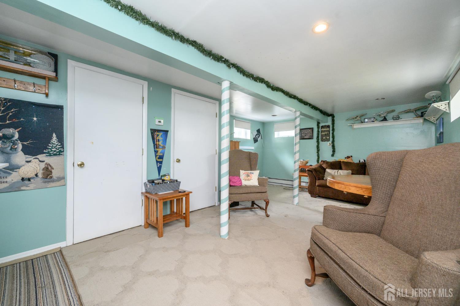 1650 Holly Road North Brunswick, NJ 08902 - Photo 24 of 41 a living room with furniture and a table