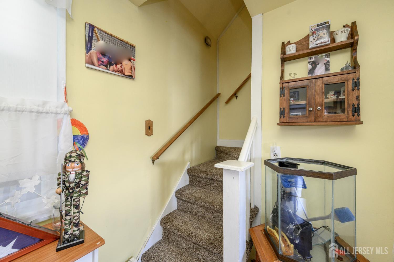 1650 Holly Road North Brunswick, NJ 08902 - Photo 28 of 41 a view of entryway and hall with wooden floor