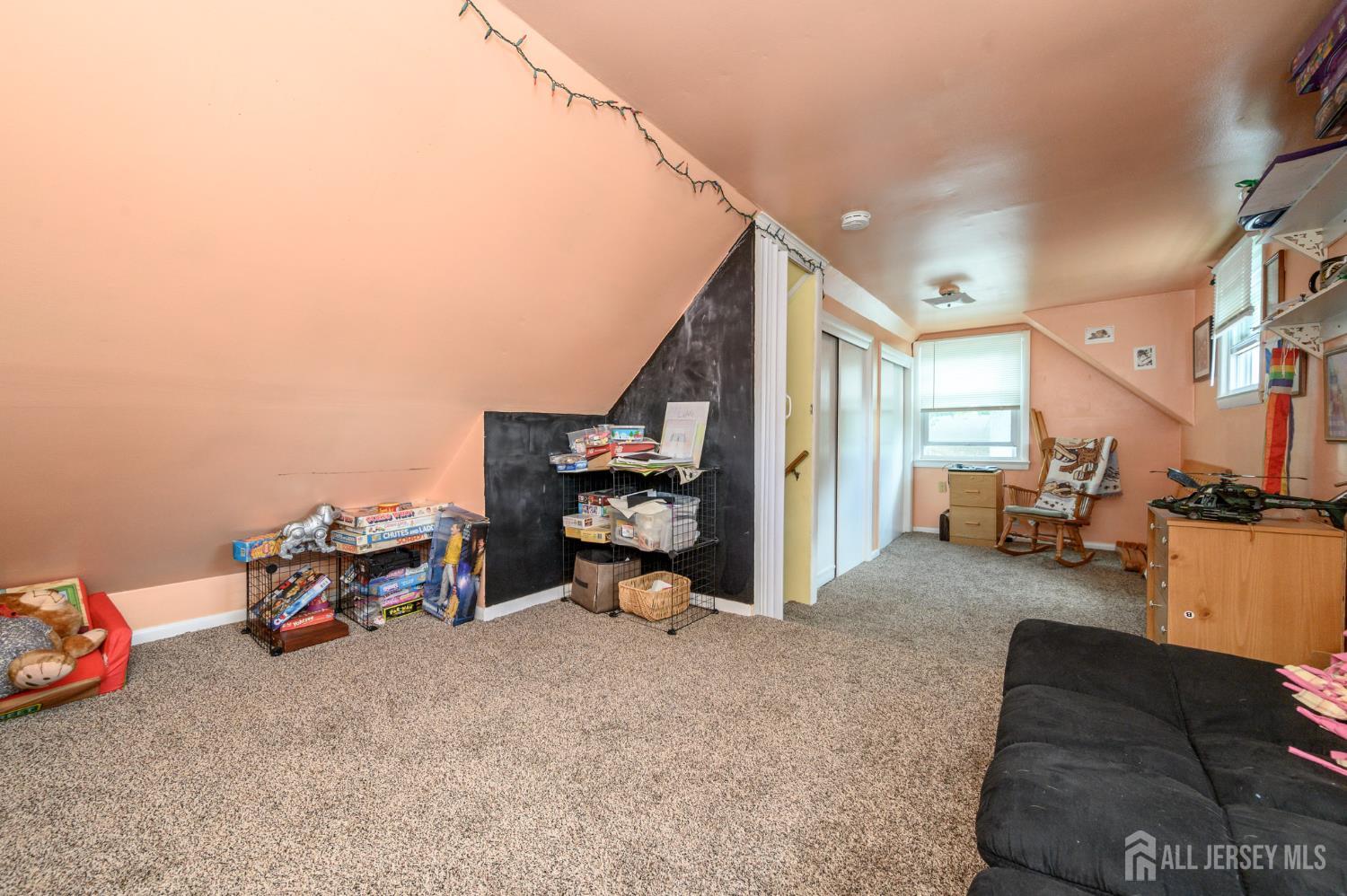 1650 Holly Road North Brunswick, NJ 08902 - Photo 30 of 41 a view of a livingroom with furniture and a couch
