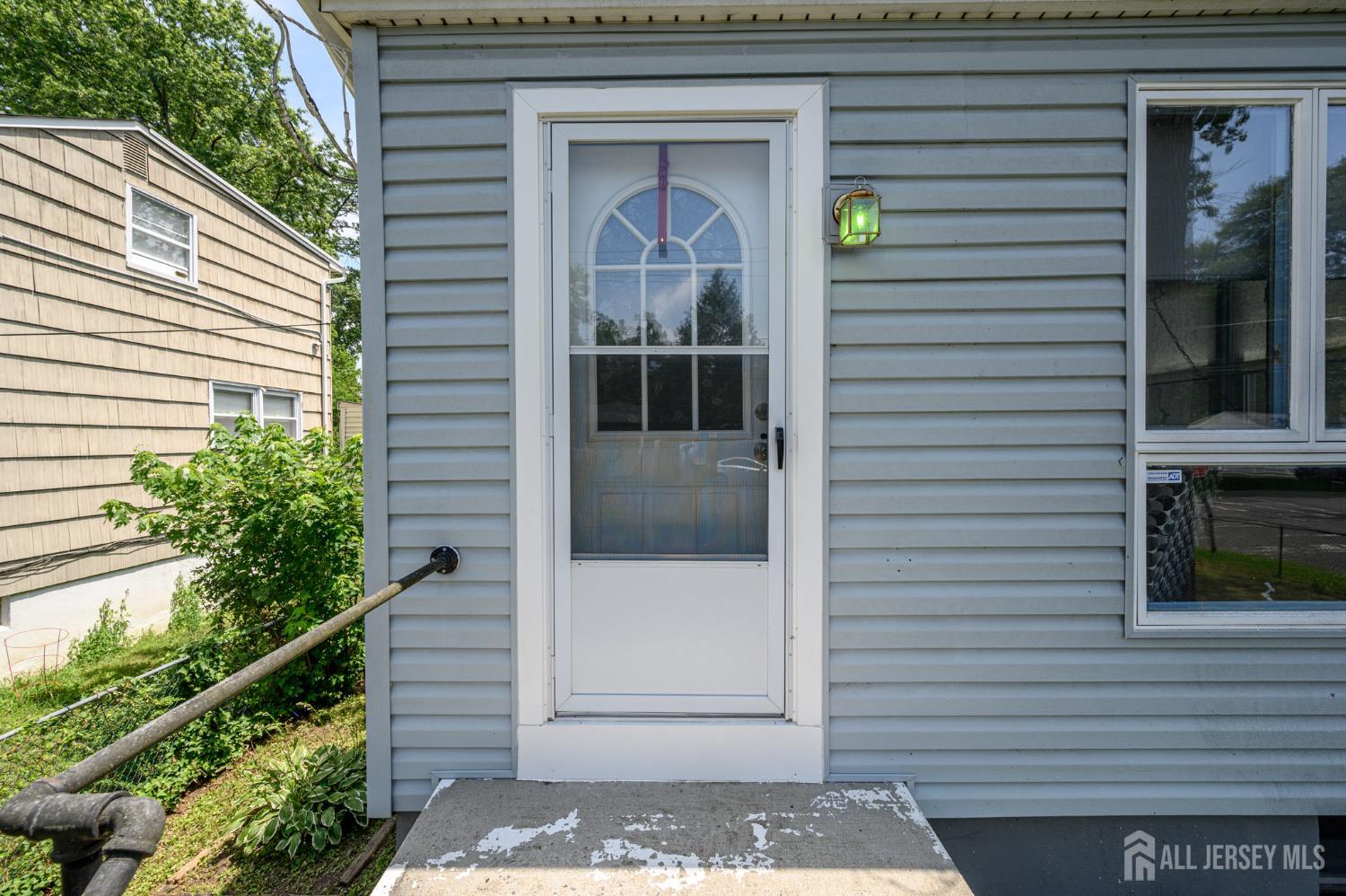 1650 Holly Road North Brunswick, NJ 08902 - Photo 3 of 41 a view of a door of the house