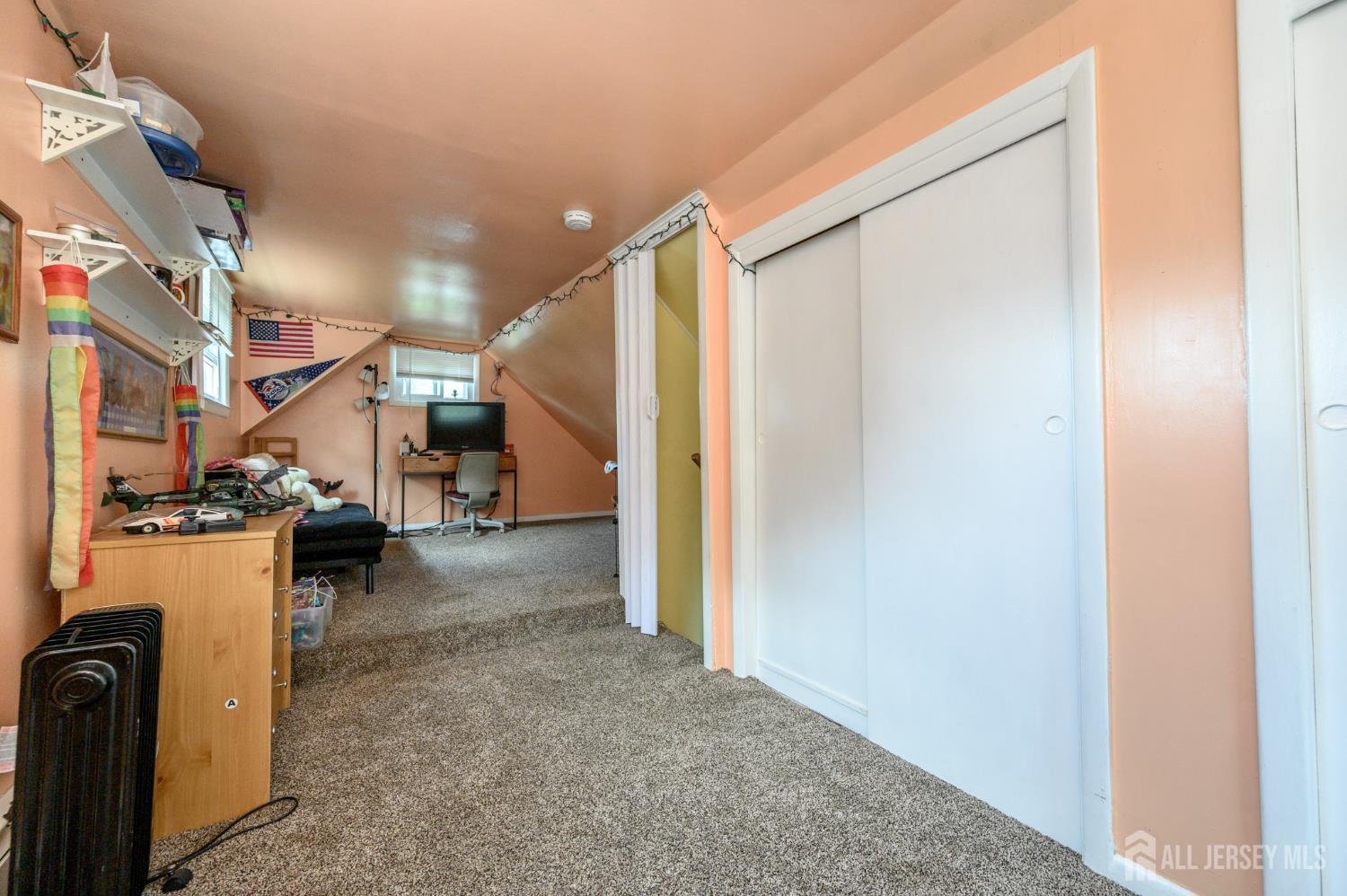 1650 Holly Road North Brunswick, NJ 08902 - Photo 32 of 41 a view of a living room with a fireplace