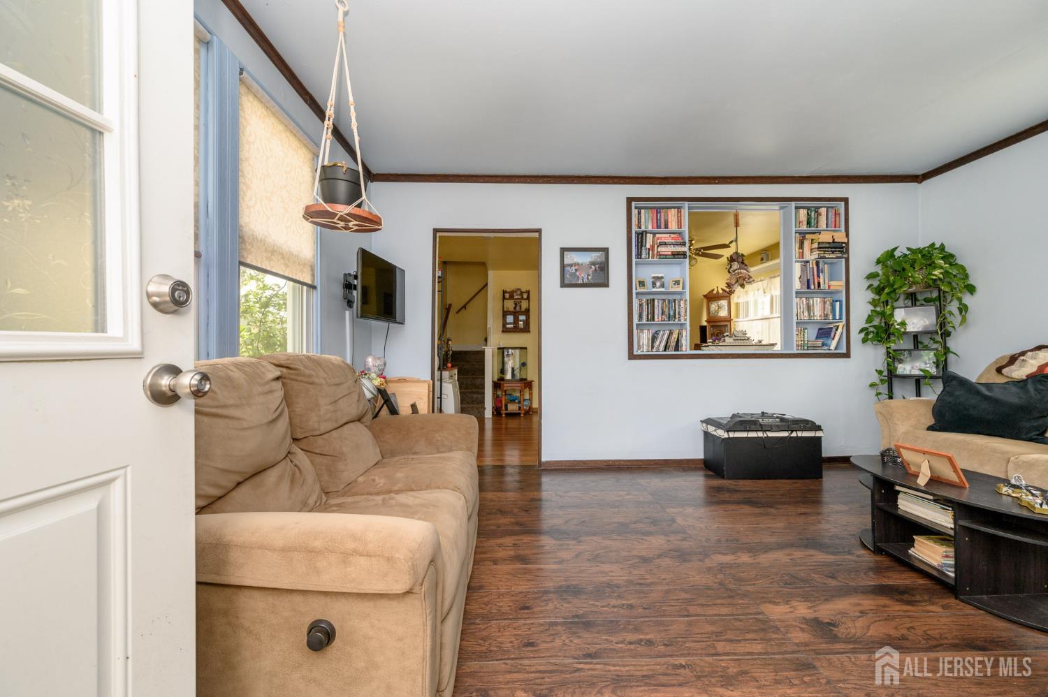 1650 Holly Road North Brunswick, NJ 08902 - Photo 4 of 41 a living room with furniture and a large window