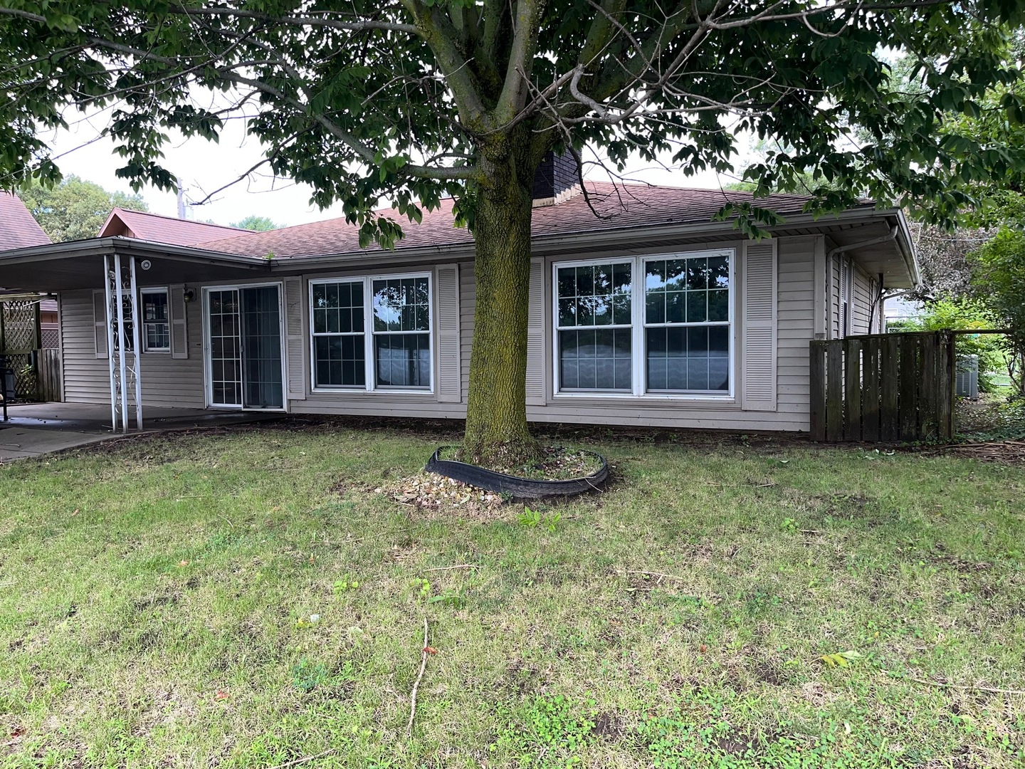 2 Beachcomber Place Pekin, IL 61554 - Photo 2 of 4 a view of a house with a garden